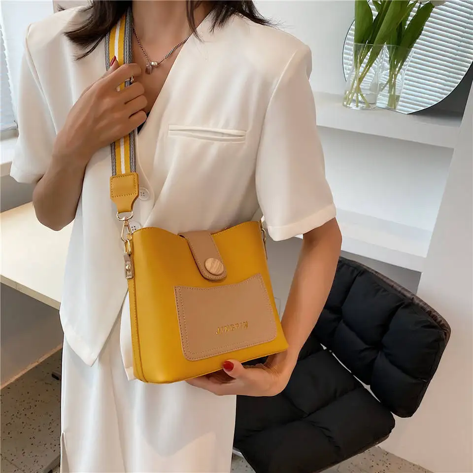 

Casual Style PU Leather Woman Bags 2021 Brand Designer Contrast Color Bucket Bags Stripe Shoulder Strap Women Bags Free Shipping