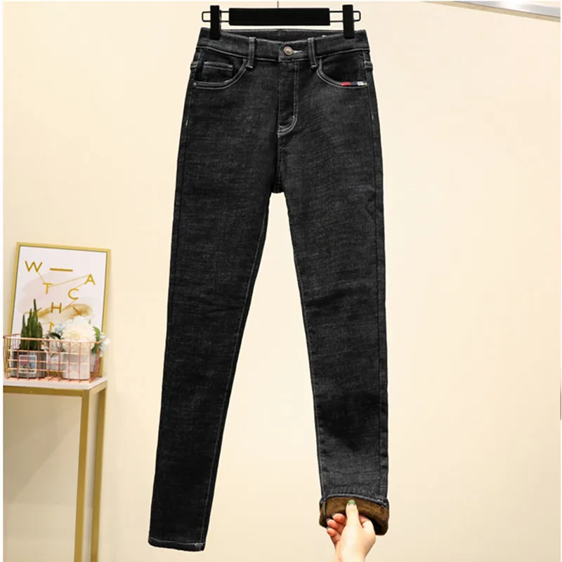 Женские зимние теплые джинсы эластичные мягкие черные с бархатной подкладкой