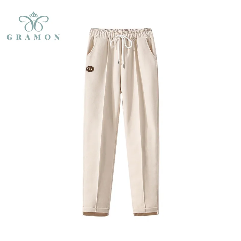 

Женские бежевые спортивные брюки-султанки с высокой талией