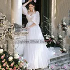 Винтажное свадебное платье с рукавами-фонариками и шлейфом