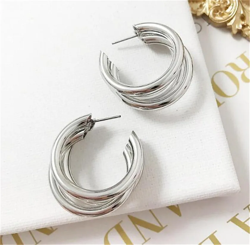 Женские серьги-кольца золотистые серебристые минималистичные с толстой трубкой