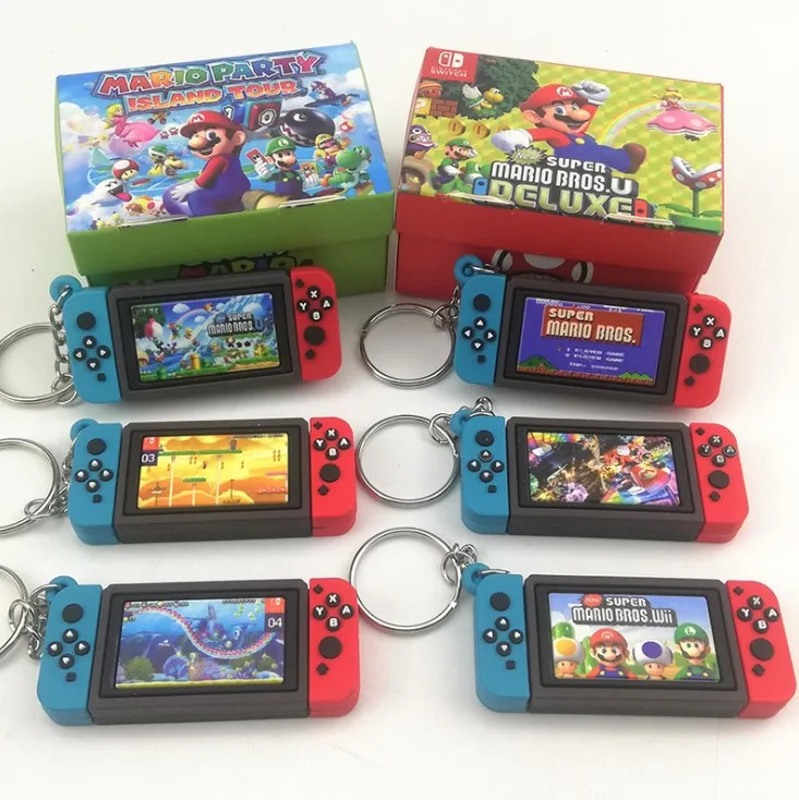 

Super Mario Keychain Switch Charm Game Handle Chain Claw Machine Mario Key Chains Ring Action Toys Figure Collection Model Gifts