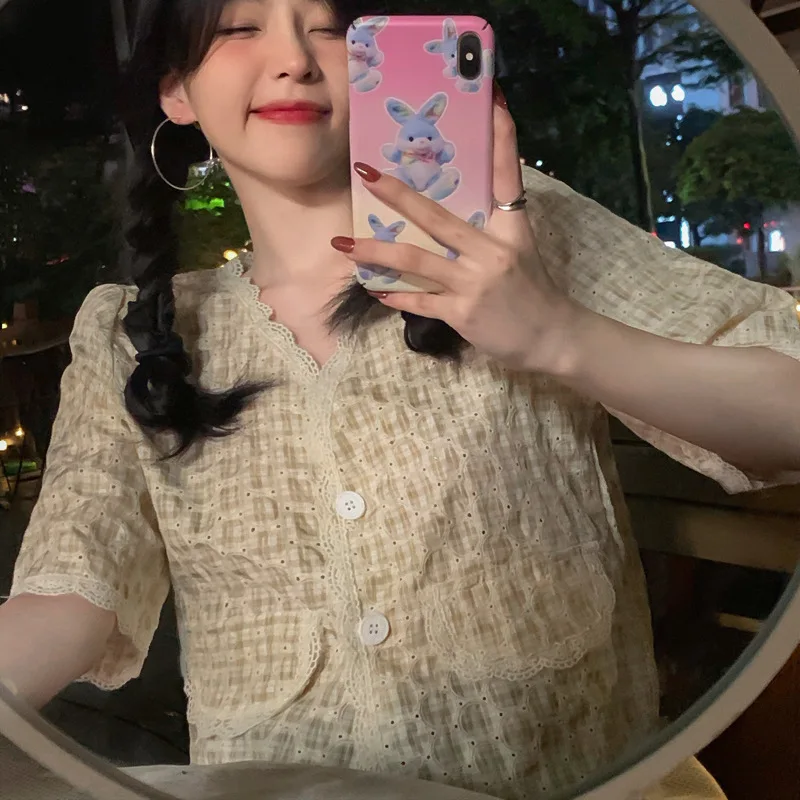 

Summer hollow short puff sleeve thin section Western style Hong Kong style shirt niche design top women