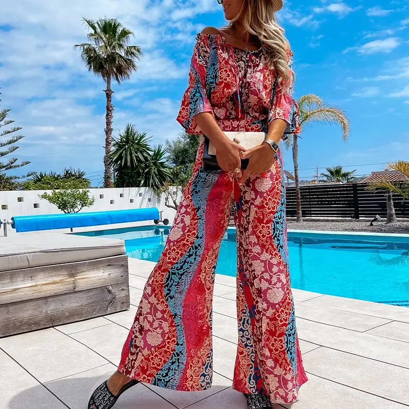 

Женский комплект из двух предметов с цветочным принтом, винтажный топ с бахромой и широкие брюки с открытыми плечами, пикантный праздничный...