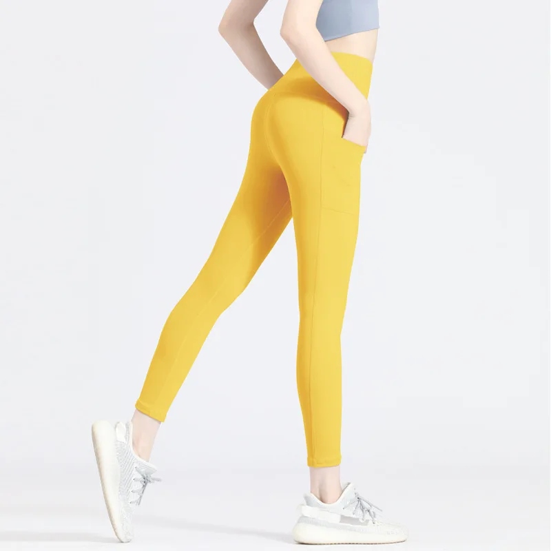 

Naked feeling European and American yoga pants fitness exercise running seamless high waist lift hip pocket elastic peach tights