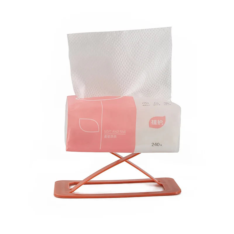 

The bottom of the tissue box, the elastic device, lift the paper sheet, the bottom support of the elastic tissue box