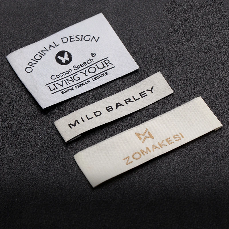 

Wholesale Custom logo woven clothing labels tags for clothes,customized garment etiquetas bags shirt hair wig name label tag