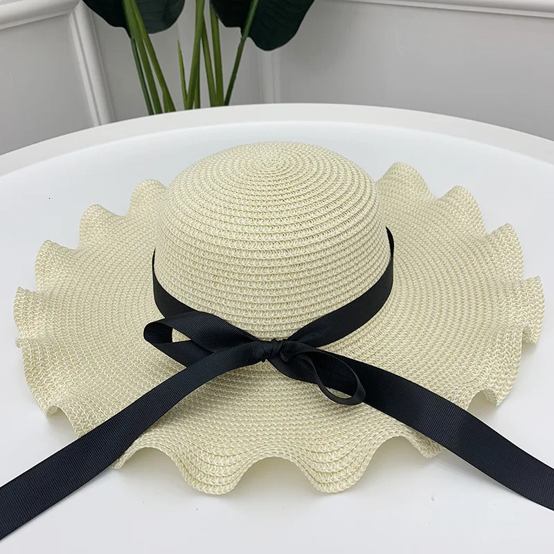 Шляпа от солнца Женская соломенная с волнистыми краями дешевая шляпа |