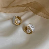 2021 new korean hollow metal fashion earrings joker geometric fine pearl women trendy push back stud earrings jewelry