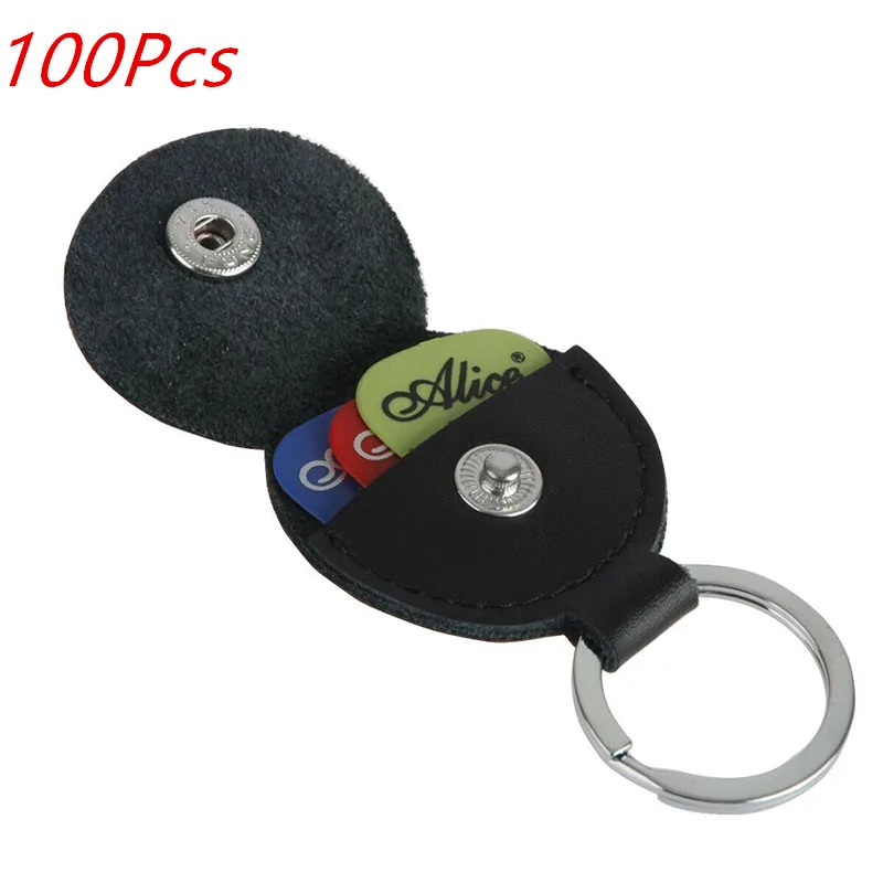 

Wholesale 100pcs Guitar Picks Holder Genuine Leather Guitarra Plectrum case Black Pick Bag Keychain Shape for Guitar Accessories