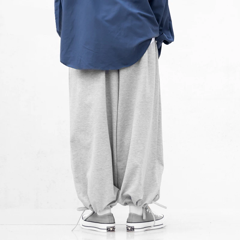 Брюки-шаровары унисекс на шнуровке серые и черные спортивные штаны в стиле