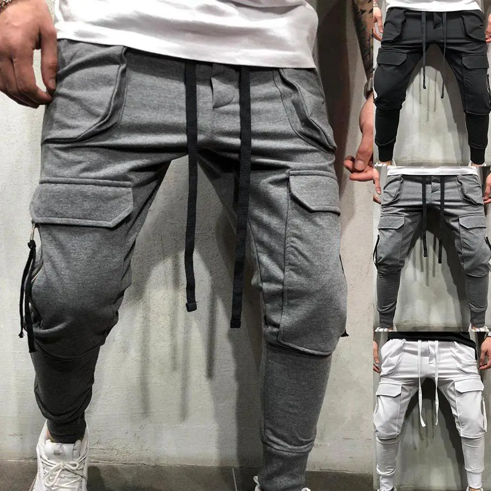 

Men Outdoor Gym Pants Elastic Sweatpants Casual Sporty Men Solid Color Drawstring Multi-pockets Cargo Pants Ankle Tie Trousers