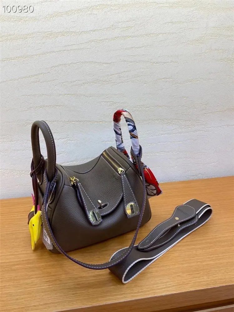 

2020 new original litchi grain head layer cowhide nurse bag single shoulder Crossbody portable gold buckle leisure bag