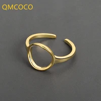 qmcoco silver color simple rings women trend hollow out round fashion temperament trendy jewelry open resizable size rngs