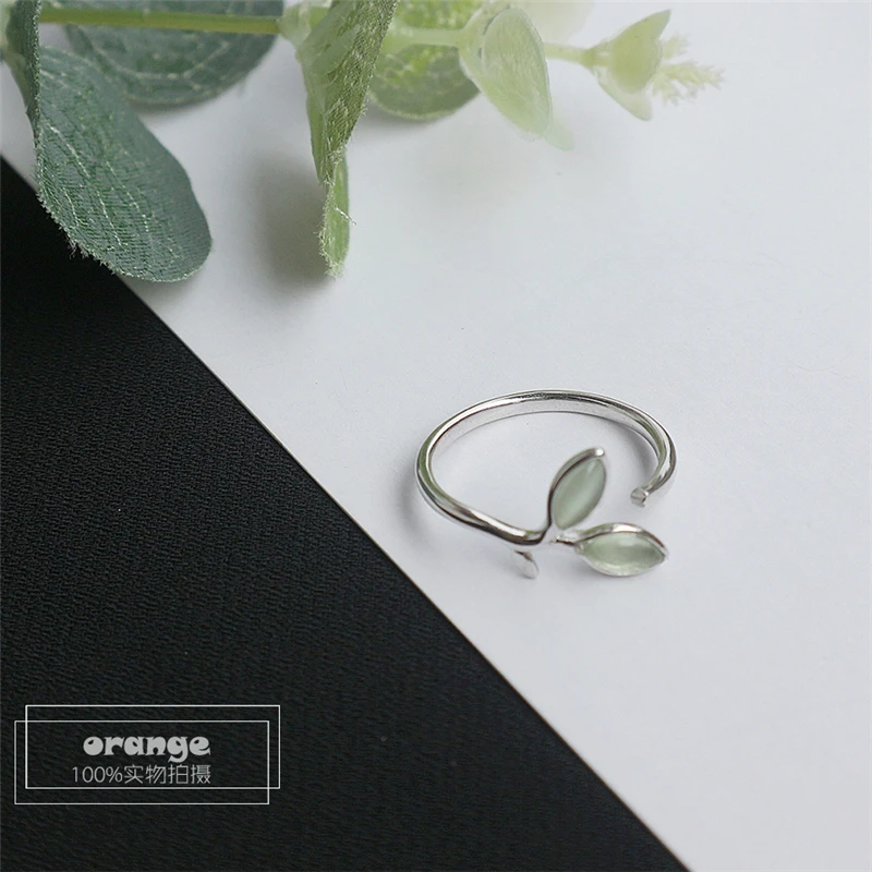 Оптовая продажа серьги гвоздики с серебряными зелеными опаловыми листьями 925