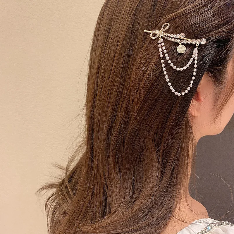 

Korean Style New Fashion Design Diamond Pearl Chain Bow Hairpin Small Fresh Fashion Simple Hairpin Net Red Side Clip Girl