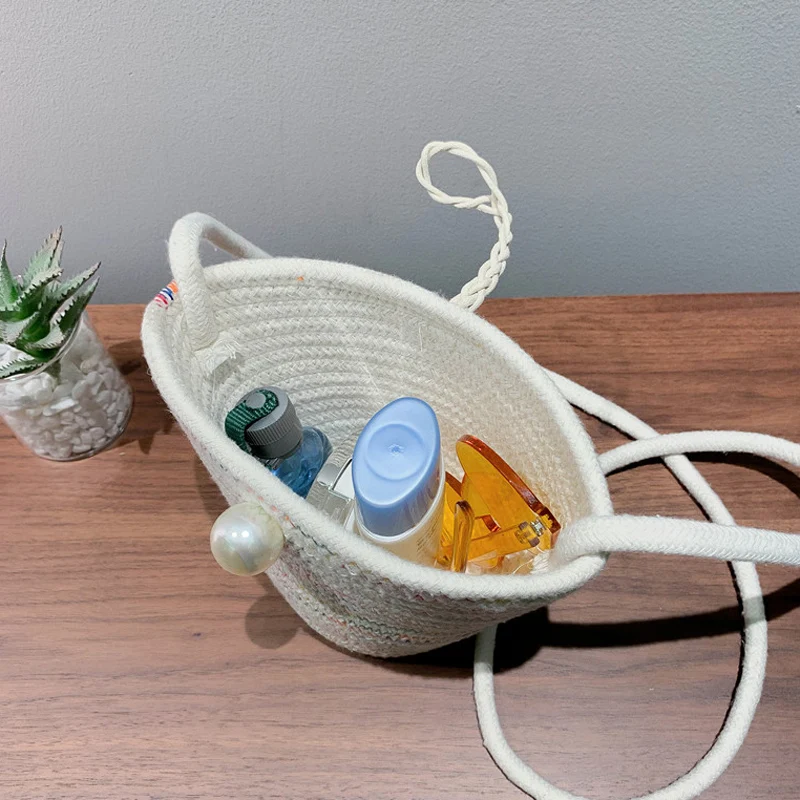 

Woven bucket bag ladies new 2020 summer mini straw bag mini baguette pearl shoulder ladies crossbody bag