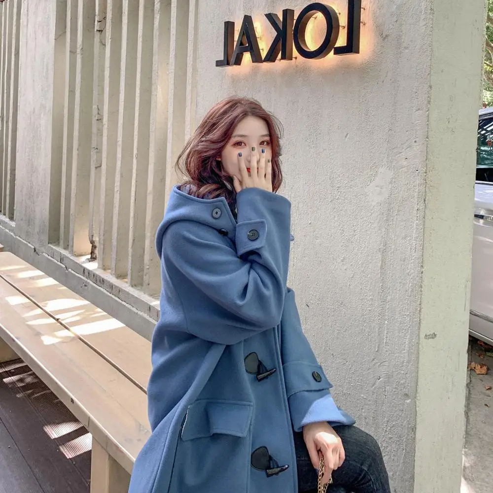 

2020New Women's horn buckle warm imitation water mane long windbreaker autumn and winter new fur one lazy fashion wild jacket