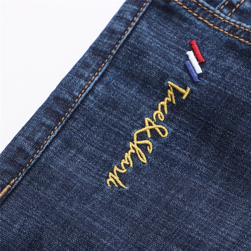 

High quality men's business jeans male casual shark denim pants fashion embroidery straight plus size homme pants full length