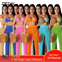 bulk items wholesale lots womens club outfits crochet knitted hollow see through two piece set crop top with pant suit 2021