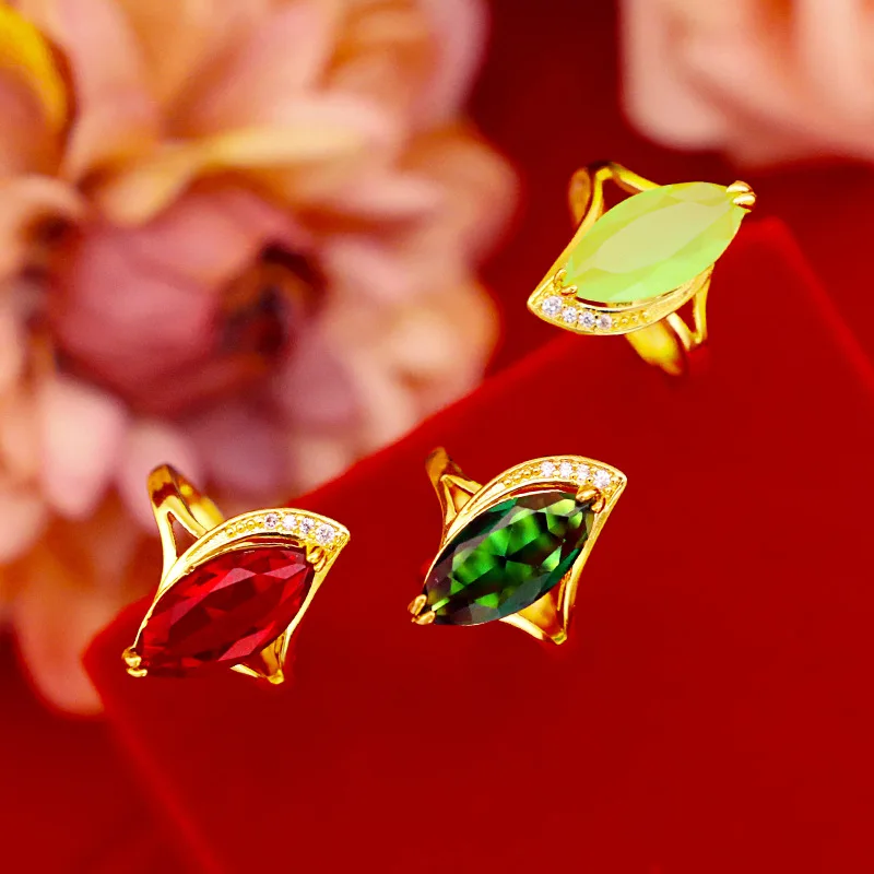 Женское золотое кольцо с изумрудами регулируемое из 14-каратного желтого золота