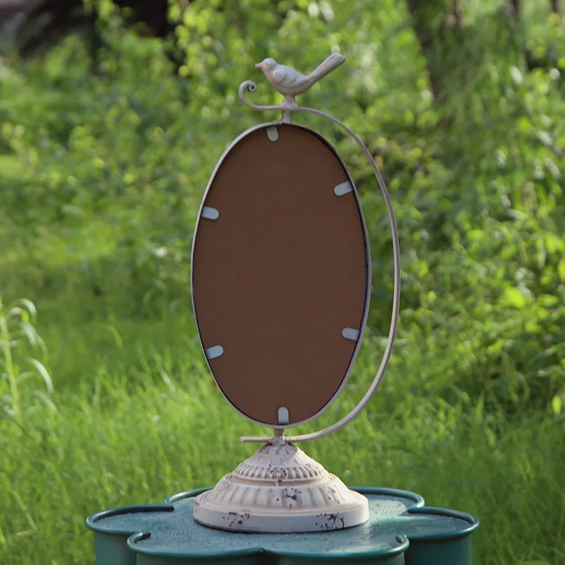 

tabletop stand metal oval vintage makeup mirror