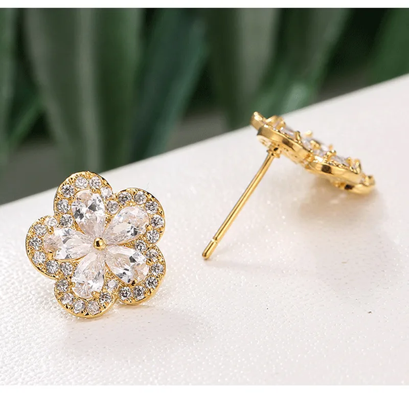 

Fashionable and creative flower shaped Zircon Earrings with copper inlaid Zircon Earrings