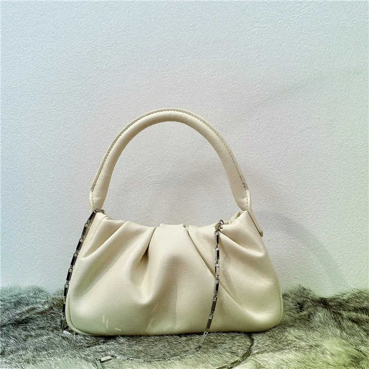 

Spring and summer 2021 new Korean version cloud fold bucket cowhide women's bag simple and fashionable one shoulder Crossbody
