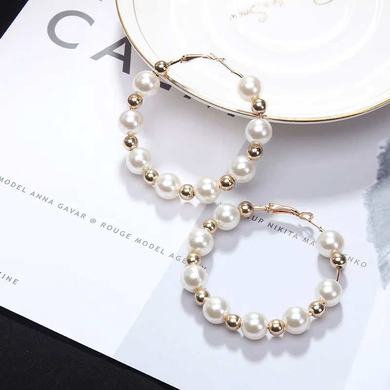 

European and American hot sale pearl earrings fashion creative earrings female temperament earrings