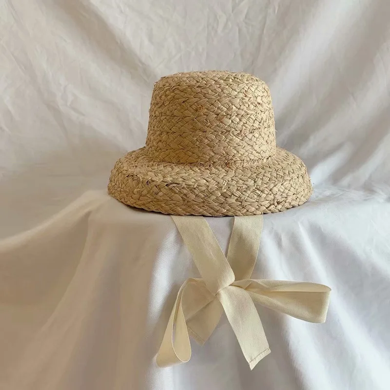 

Children Hand-knitted Raffia Retro Flat Top Sun Hats Girls and Boys Summer Travel Sunscreen Vacation Straw Hat with Lacing S1161