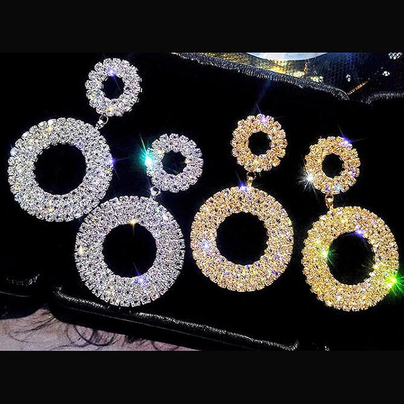 Женские серьги подвески золотого цвета круглые стразы серебристого с