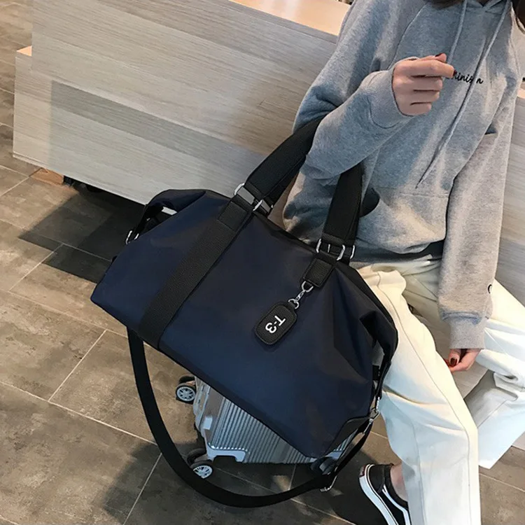 

Fashion Short Trip Travel Bag Women's Hand Luggage Men Korean-style Large Capacity Travel Bag Waterproof Sports Gym Bag