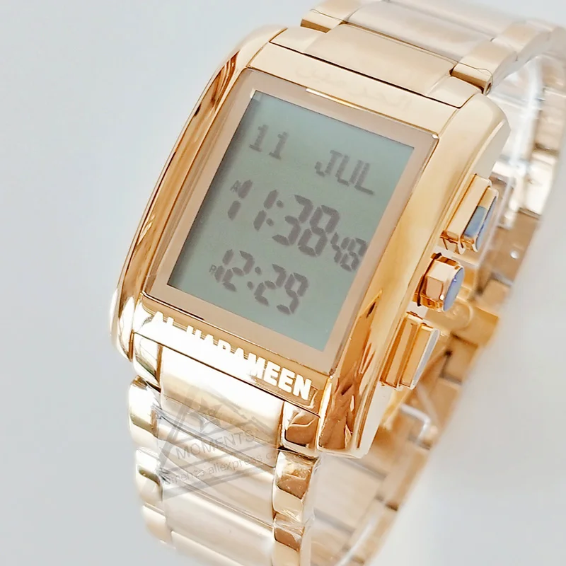 Запрограммированные для молитвы часы мусульманского мужчины и женщины с