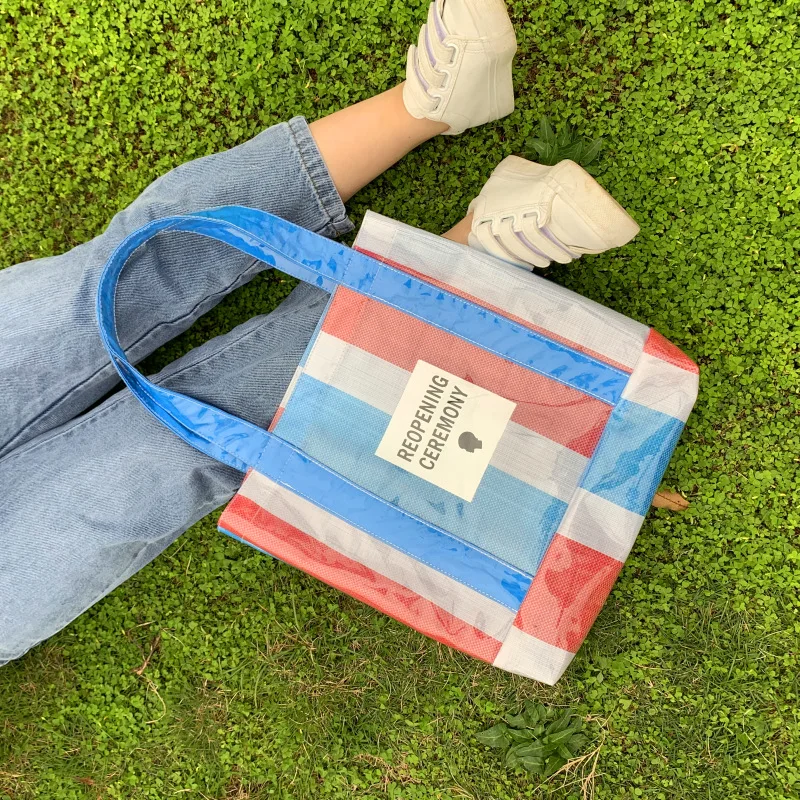 

2019 new girl small fresh one shoulder bag female Tote bag large capacity versatile tote bag PVC woven bag trend