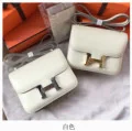 

2020 new leather women's bag h-button Kangkang bag fashion one shoulder slant span small square bag cow skin box bean curd bag