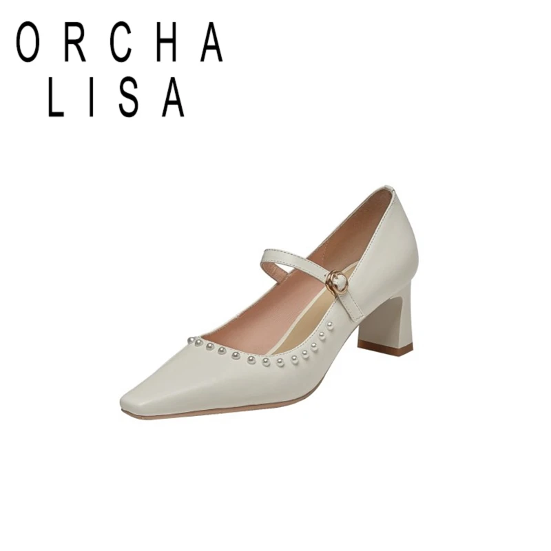 

Женский сарафан из натуральной кожи на высоком каблуке с пряжкой и жемчугом