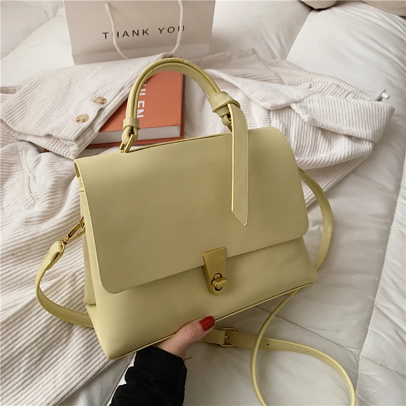 

Korean style women's handbag, with rotary lock, knotting handle, PU leather, shoulder strap handbag, 2021