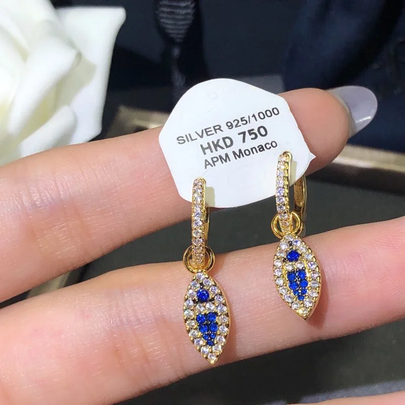 

Lucky Fish Earrings Women's European and American Golden New High Sense Delicate Earrings Pair of Elegant Round Face Earrings