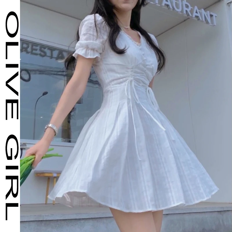 

2021 Korean Style White Elegant Kawaii Mini Dress Women Summer Beach Light Pleated Dresses Fashion Lace-up Puff Sleeve Clothing