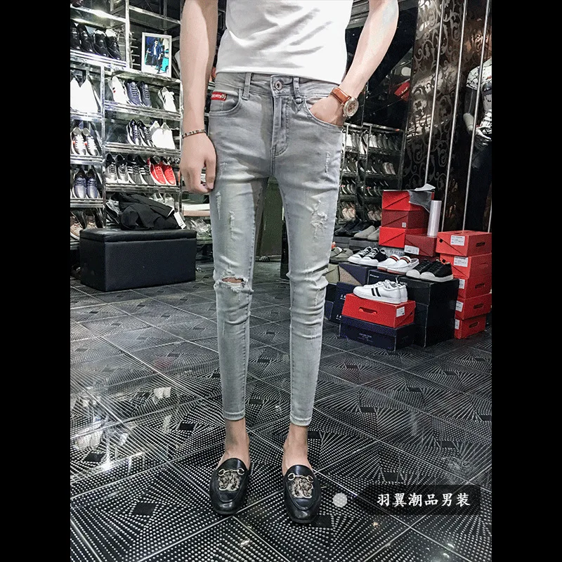 

Summer 2020 new social guy ripped hole cat whiskers feet cropped skinny pants men hip hop fashion trend men's slim jeans