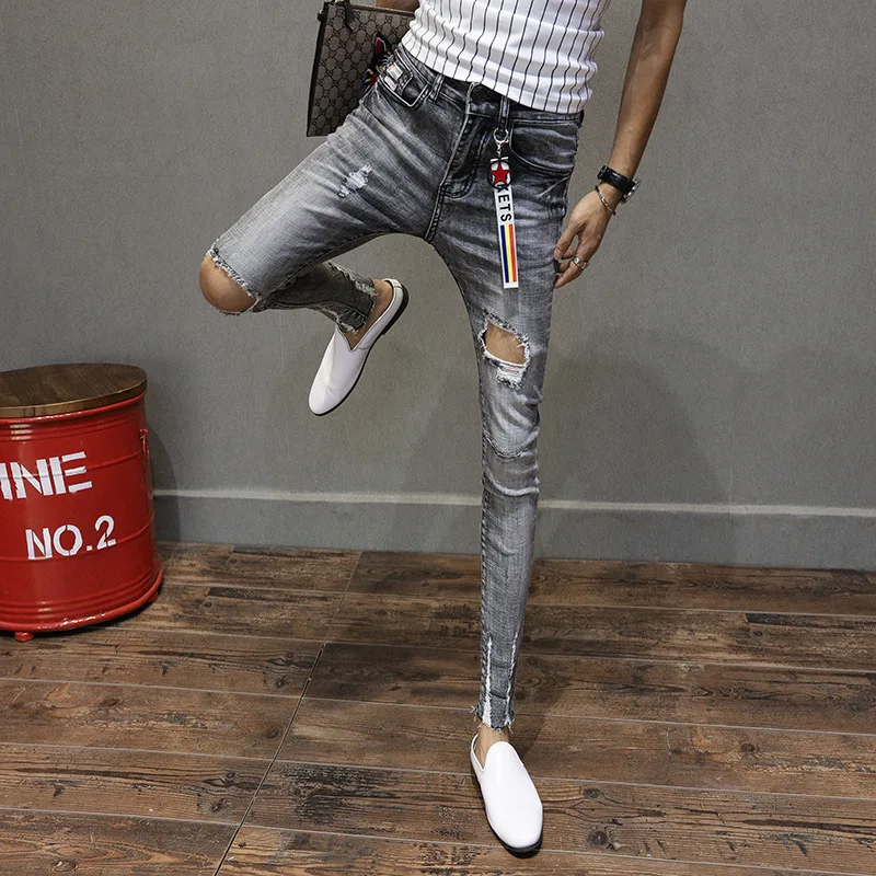 

2021 2020 Fashion Casual teenagers cowboy Korean trendy knee ripped hole skinny jeans men's raw edge fashion stretch pants