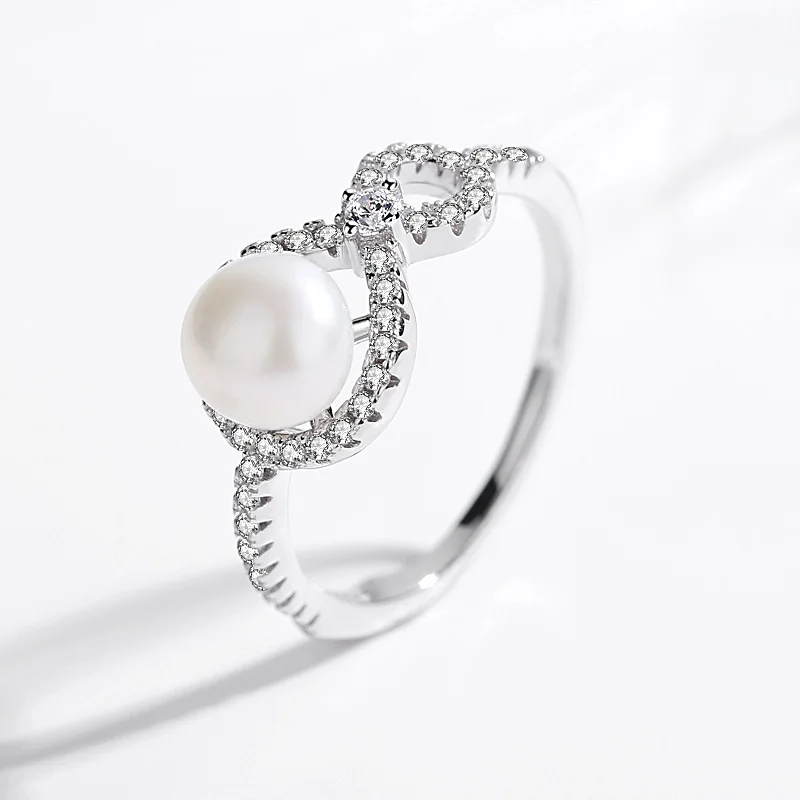 Кольцо женское бесконечное из серебра 100% пробы с натуральным пресноводным