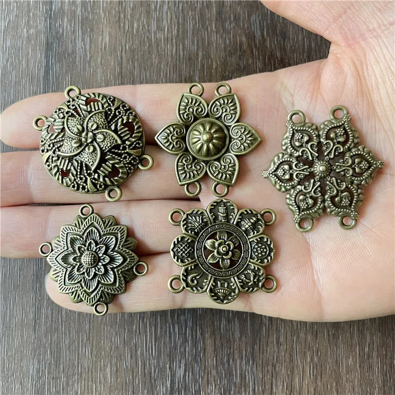 

10pcs kinds of antique silver flower-shaped hollow bronze dream is catching DIY handmade crafts jewelry connectors