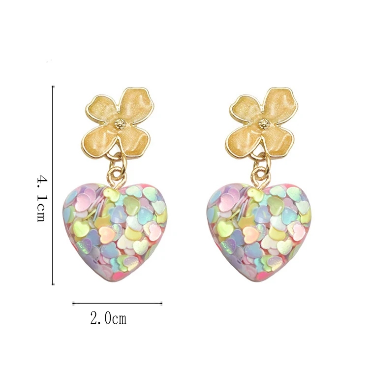 Симпатичные милые серьги-клипсы золотого цвета с цветком из цветного стекла в