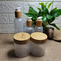 8oz jar with bamboo lid 250ml cosmetic frosted 60ml 120ml 150ml 250ml shampoo bamboo pump bottle wholesale body lotion bottle