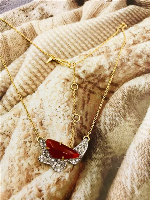 

Resin Irregular Shape Embellished with Crystals Pendant Necklace