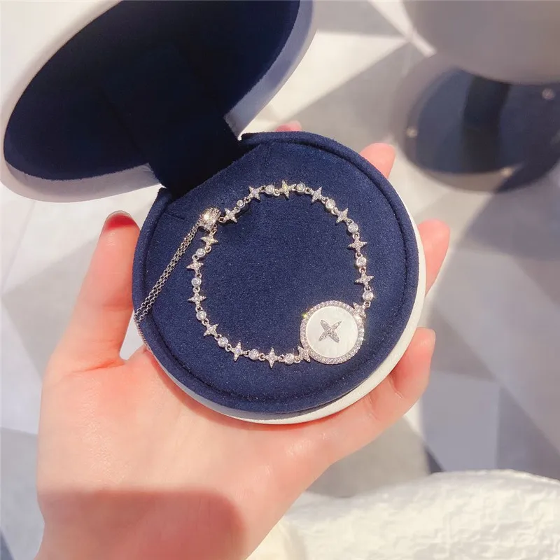 Браслет-манжета Женский классический браслет из натуральных ракушек с фианитами