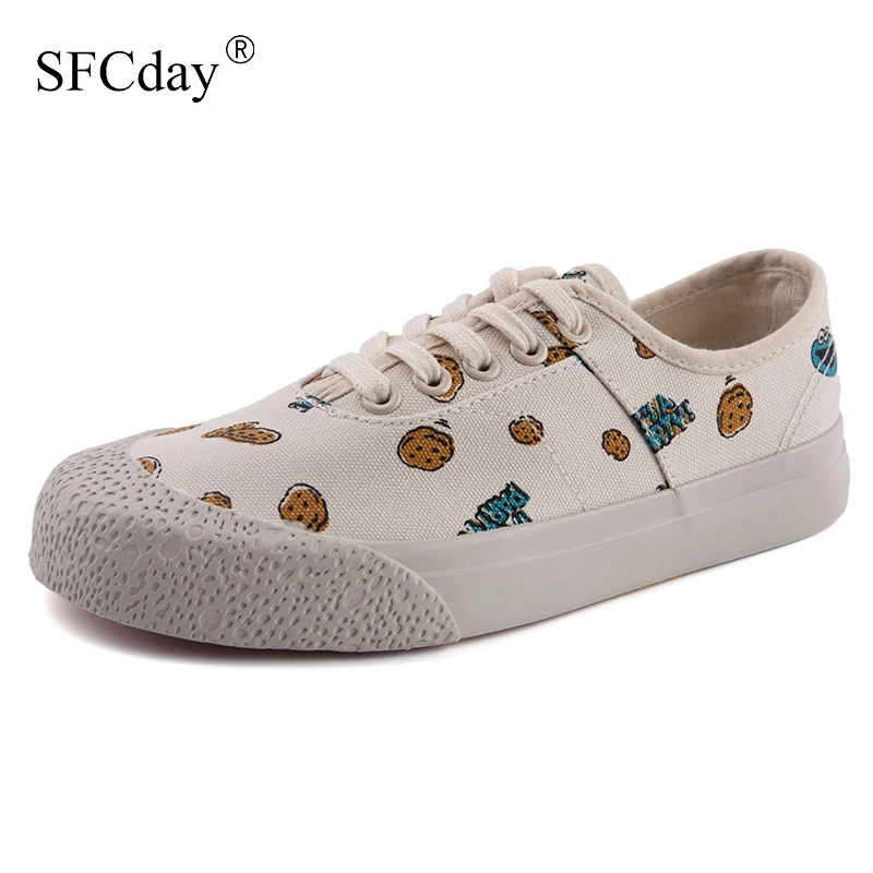 Женская парусиновая обувь на плоской подошве с граффити вулканизированной