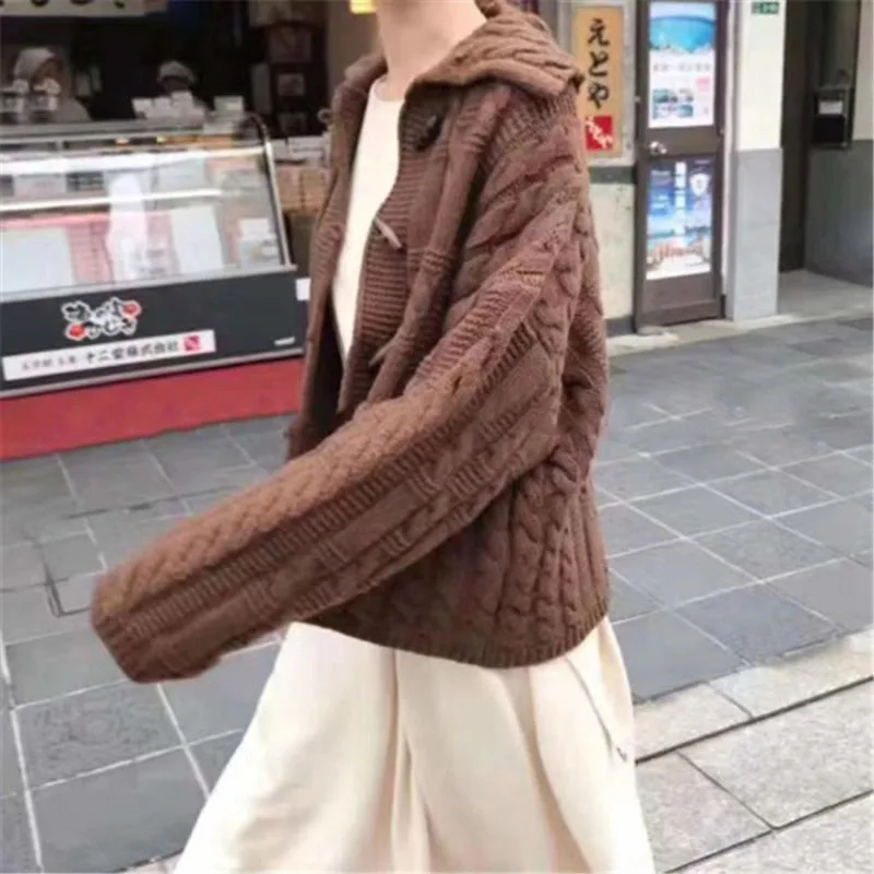 Knitted wool sweater female winter 2019 new Korean version of the loose long sleeved horn buckle rod women's cardigan |