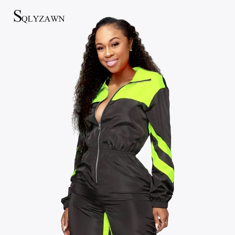 Женский спортивный комбинезон на молнии с длинным рукавом и цветными блоками